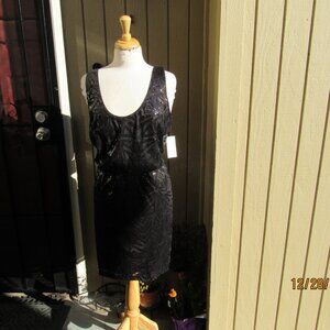 #743  NEW WOMAN'S BLACK SEQUIN DRESS BY JESSICA SIMPSON  (SIZE 14)